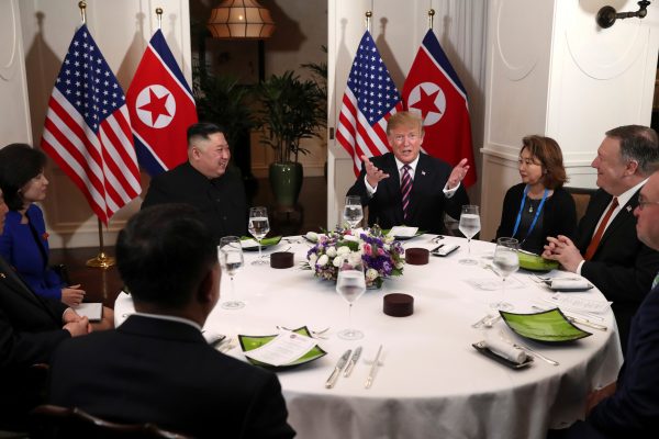 U.S. President Donald Trump and North Korean leader Kim Jong Un sit down for a dinner during the second U.S.-North Korea summit at the Metropole Hotel in Hanoi, Vietnam, 27 February 2019 (Photo: Reuters/Leah Millis).