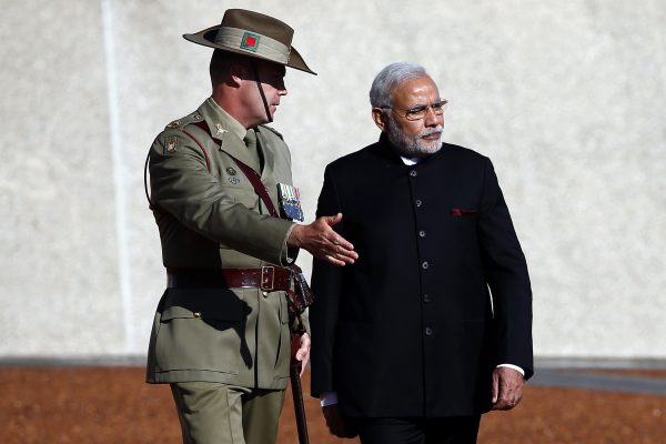 India's Prime Minister Narendra Modi participates in a welcoming ceremony at Parliament House in Canberra 18 November 2014 (Photo: Reuters/David Gray).