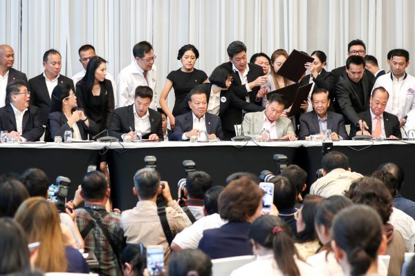 Sudarat Keyuraphan, Pheu Thai Party's prime minister candidate (2L), Thanathorn Juangroongruangkit, leader of the Future Forward Party (3L) and leaders of other parties attend a news conference to form a 