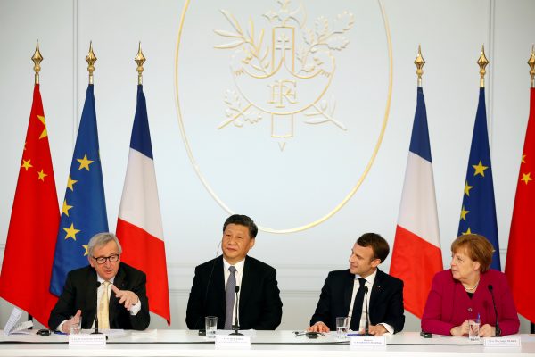 French President Emmanuel Macron, Chinese President Xi Jinping, German Chancellor Angela Merkel and European Commission President Jean-Claude Juncker hold a news conference at the Elysee Palace in Paris, France, 26 March 2019 (Photo: Thibault Camus/Pool via Reuters).
