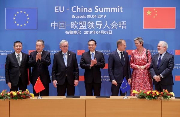 Chinese Premier Li Keqiang, European Council President Donald Tusk and European Commission President Jean-Claude Juncker pose with hinese Minister of State Administration of Market Regulation Zhang Mao, European Commissioner for Competition Margrethe Vestager, Zhang Jianhua, Chinese Minister of Energy and European Commissioner for Climate Action and Energy Miguel Arias Canete after the signing ceremony at a EU-China Summit in Brussels, Belgium, 9 April 9 2019. (Photo:Stephanie Lecocq/Pool via Reuters).