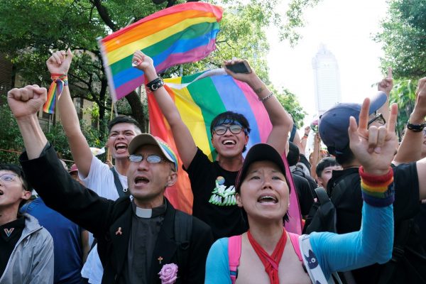 Same-sex marriage supporters celebrate after Taiwan became the first place in Asia to legalise same-sex marriage, outside the Legislative Yuan in Taipei, Taiwan, 17 May 2019 (Photo: Reuters/Tyrone Siu).