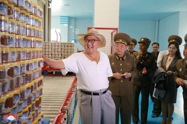 North Korean leader Kim Jong Un visits a factory in this undated photo released by North Korea's Korean Central News Agency, Pyongyang, 7 August 2018 (Photo: Reuters/KCNA)