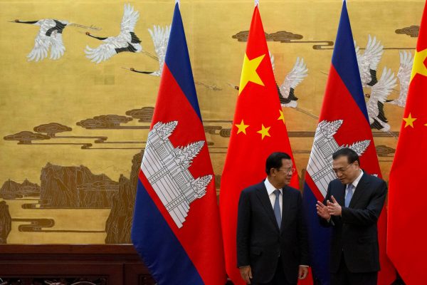 Cambodian Prime Minister Hun Sen chats with Chinese Premier Li Keqiang during a signing ceremony at the Great Hall of the People, Beijing, January 2019 (Photo: Reuters/Ng Han Guan).