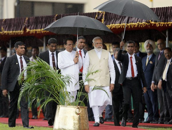 India's Prime Minister Narendra Modi arrives with Sri Lanka's President Maithripala Sirisena during his welcome ceremony at the Presidential Secretariat in Colombo, Sri Lanka, 9 June 2019. (Photo: REUTERS/ Dinuka Liyanawatte)