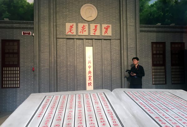 A journalist is seen inside the history gallery of the Party School of the Chinese Communist Party (CPC)'s Central Committee during a government organised visit in Beijing, China 26 June 2019. (Photo: REUTERS/Ben Blanchard)