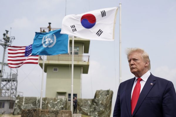 US President Donald Trump looks on at the demilitarized zone separating the two Koreas in Panmunjom, South Korea, 30 June 2019 (Photo: Reuters/Kevin Lamarque).