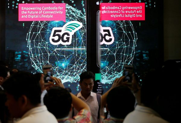 People attend a 5G launching ceremony at the Smart Axiata Telecommunications company in Phnom Penh, Cambodia 8 July 2019. (Photo: Reuters/Samrang Pring).