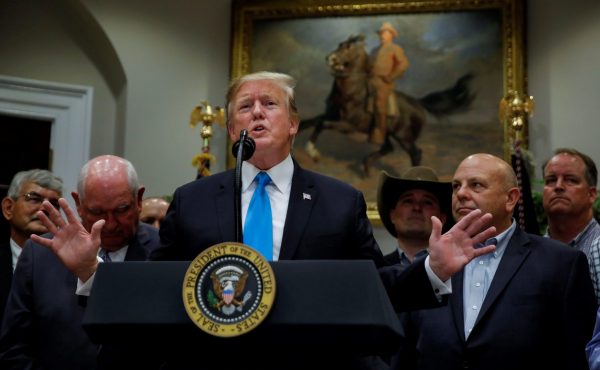 US President Donald Trump speaks to reporters on a range of issues during an event devoted to 'America's farmers and ranchers' in the Roosevelt Room of the White House in Washington, US, 23 May 2019 (Photo: REUTERS/Carlos Barria).