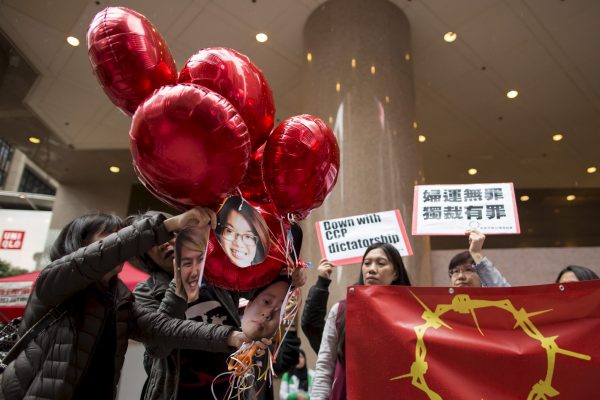 Supporters release balloons with pictures of the 'Feminist Five' detained on the eve of International Women's Day in 2015 (Photo: Reuters/Siu).