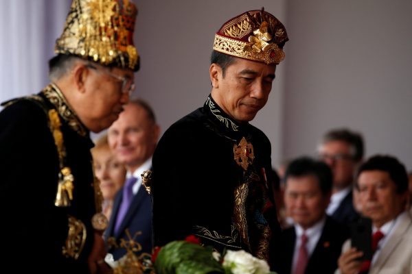 Indonesia President Joko Widodo and Vice President Jusuf Kalla arrive at a ceremony to celebrate Indonesia's 74th Independence Day at the Presidential Palace in Jakarta, Indonesia, August, 2019. (Photo: Reuters/Kurniawan)