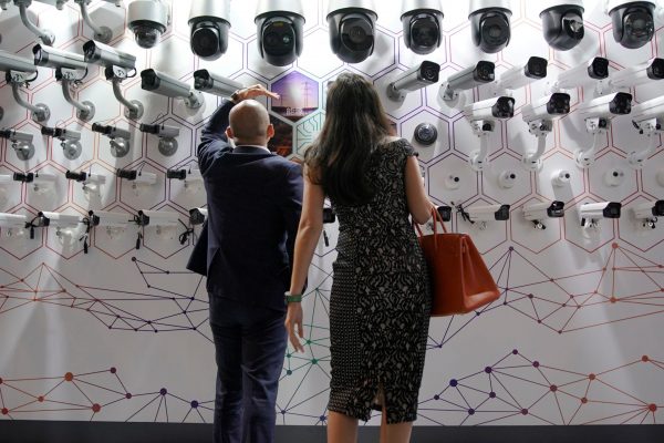People look at surveillance cameras at the annual Huawei Connect event in Shanghai, China, 18 September 2019 (Photo: Reuters/Aly Song).
