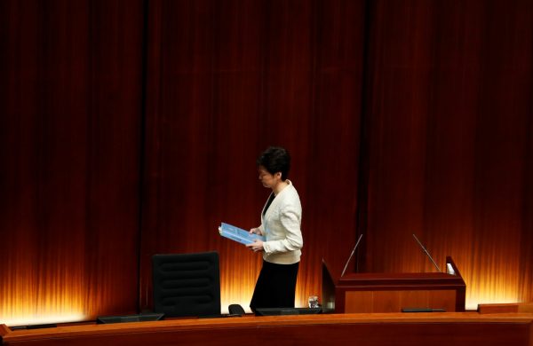 Hong Kong's Chief Executive Carrie Lam leaves as the Legislative Council meeting is adjourned due to heckling by pro-democracy lawmakers, in Hong Kong, 17 October 2019 (Photo: REUTERS/Kim Kyung-Hoon).