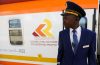 A Kenya Railways attendant stands next to a train along the Standard Gauge Railway (SGR) line constructed by the China Road and Bridge Corporation (CRBC) and financed by Chinese government in Mai Mahiu, Kenya 16 October, 2019 (Photo: Reuters/Mukoya).