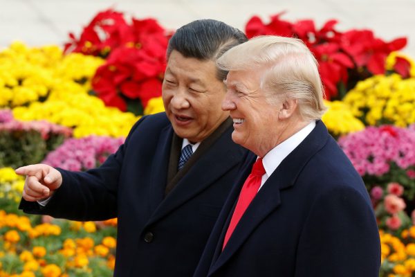 US President Donald Trump takes part in a welcoming ceremony with China's President Xi Jinping in Beijing, China, 9 November 2017 (Photo:Reuters/Damir Sagolj/File Photo).