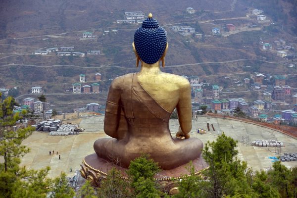 The Buddha Dordenma statue overlooks the town of Thimphu, Bhutan, 16 April 2016 (Photo: Reuters/Cathal McNaughton).