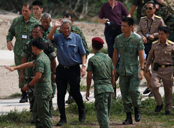 Singapore's Defence Minister Ng Eng Hen arrives with ASEAN military officials for an ASEAN Defence Ministers' Meeting (ADMM)-Plus counter-terrorism exercise in Singapore, 9 May 2016 (Photo: Reuters/Edgar Su).