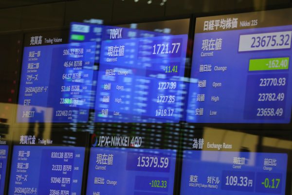 An electronic stock board displays the Tokyo Stock Exchange in Tokyo, Japan (Photo: Reuters/Yohei Osada/AFLO).