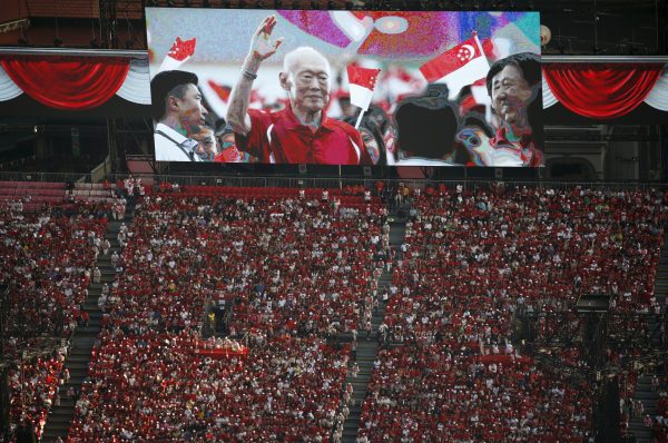 A video tribute of former prime minister Lee Kuan Yew is played during a Golden Jubilee celebration parade rehearsal in Singapore, 1 August 2015 (Reuters/Edgar Su).