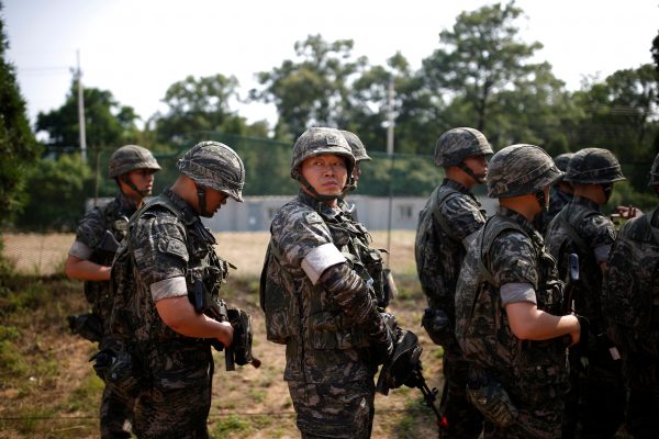 South Korean marines stand during a media tour organised by the Defence Ministry at a marine base near the demilitarized zone separating the two Koreas in Gimpo, South Korea, 10 June 2016 (Photo: REUTERS/Kim Hong-Ji).