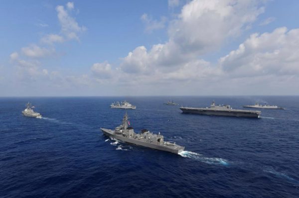 Vessels from the U.S. Navy, Indian Navy, Japan Maritime Self-Defense Force and the Philippine Navy sail in formation at sea, in this recent taken handout photo released by Japan Maritime Self-Defense Force on 9 May 2019 (Japan Maritime Self-Defense Force via Reuters).