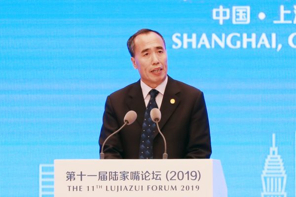 Wang Zhaoxing, Vice Chairman of the China Banking Regulatory Commission (CBRC), speaks during the 11th Lujiazui Forum 2019, saying the last four decades of the country's economic reforms have shown that ‘openness brings progress, shutting off brings backwardness’ in Shanghai, China, 13 June 2019 (Photo: Reuters/Imagine China/Bai Kelin).