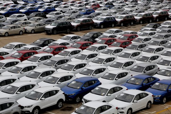 Cars waiting to be exported aboard are lined up at a port in Lianyungang city, east China's Jiangsu province, with the official manufacturing Purchasing Managers' Index rising to 49.7 in July, up from 49.4 in June, according to a statement of the National Bureau of Statistics, 31 July 2019 (Photo: Reuters/Wang Chun).