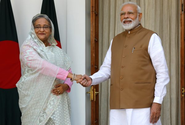 India's Prime Minister Narendra Modi shakes hands with his Bangladeshi counterpart Sheikh Hasina before their meeting at Hyderabad House in New Delhi, India, 5 October 2019 (Photo: Reuters/Altaf Hussain).