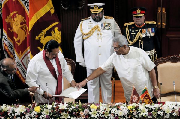 Sri Lanka's President Gotabaya Rajapaksa and his brother and former leader Mahinda Rajapaksa, who was appointed as the new Prime Minister, are seen during the swearing in ceremony in Colombo, Sri Lanka 21 November, 2019 (Photo: Reuters/Liyanawatte).