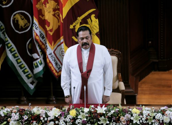 Sri Lanka's former leader Mahinda Rajapaksa, who was appointed as the new Prime Minister, looks on during the swearing in ceremony in Colombo, Sri Lanka, 21 Novermber 2019 (Photo: Reuters/Dinuka Liyanawatte).