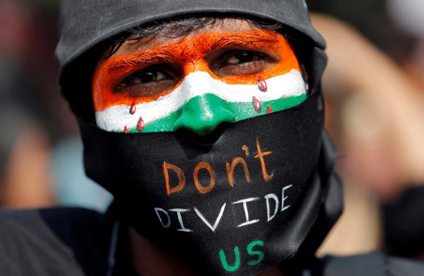 A demonstrator attends a protest against riots following clashes between people demonstrating for and against a new citizenship law in New Delhi, India, 3 March 2020 (Photo: Reuters/Adnan Abidi).