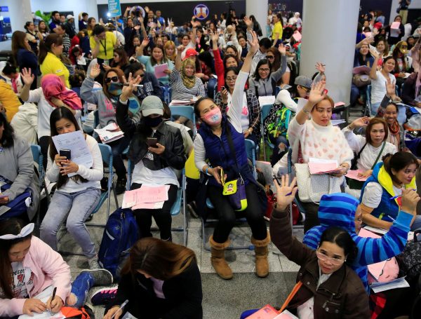 Overseas Filipino Workers (OFW) from Kuwait gather upon arrival at the Ninoy Aquino International Airport in Pasay city, Metro Manila, Philippines 21 February , 2018. Following President Rodrigo Duterte's call to evacuate workers after a Filipina was found dead stuffed inside a freezer (Photo: Reuters/Ranoco).