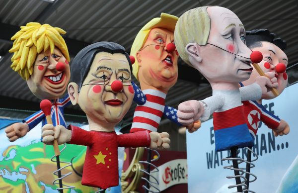 Figures depicting Britain's Pime Minister Boris Johnson, Chinese President Xi Jinping, US President Donald Trump, Russian President Vladimir Putin and North Korea's leader Kim Yong Un are seen on a carnival float during a sneak preview for the upcoming Rose Monday carnival parade in Cologne, Germany, 18 February, 2020 (Photo: Reuters/Rattay).