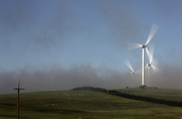 Wind turbines operate at the Capital Wind Farm near Tarago, about 35 kilometres north of Canberra, Australia (Photo: Reuters/Tim Wimborn).