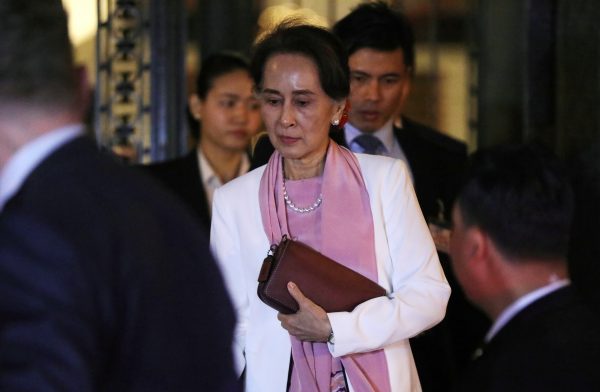 Myanmar's leader Aung San Suu Kyi leaves the International Court of Justice (ICJ), the top United Nations court, after court hearings in a case filed by Gambia against Myanmar alleging genocide against the minority Muslim Rohingya population, in The Hague, Netherlands 12 December, 2019 (Photo: Reuters/Eva Plevier).