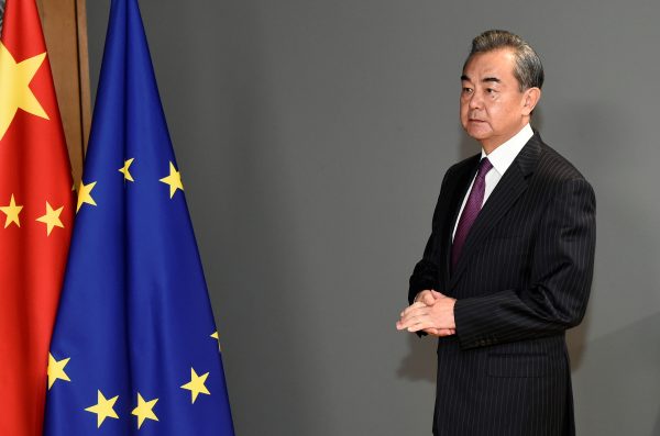 Chinese Foreign Minister Wang Yi waits before a meeting with European Council President Charles Michel at the EU council headquarters in Brussels, Belgium, 17 December 2019 (Photo: Reuters/John Thys).