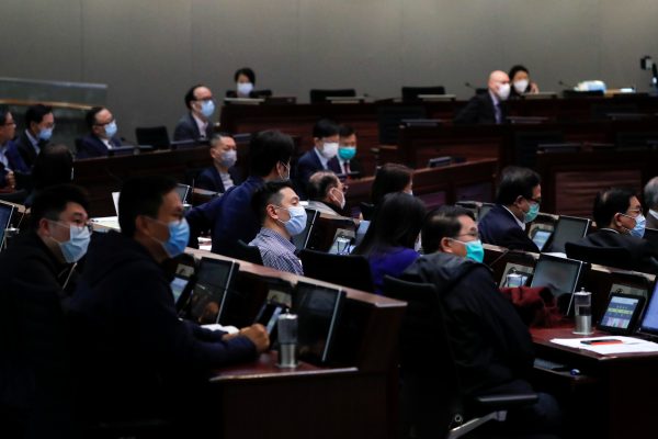 Legislators wear masks to avoid the spread of the coronavirus disease (COVID-19) during the Legislative Council's House Committee meeting, in Hong Kong, China 24 April, 2020 (Photo: Reuters/Tyrone Siu).