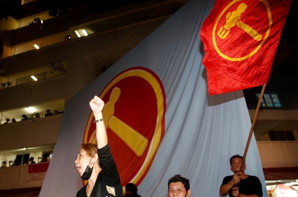 Opposition Workers' Party supporters celebrate the results of the general election in Singapore on 11 July 2020 (Photo: Reuters/Edgar Su).
