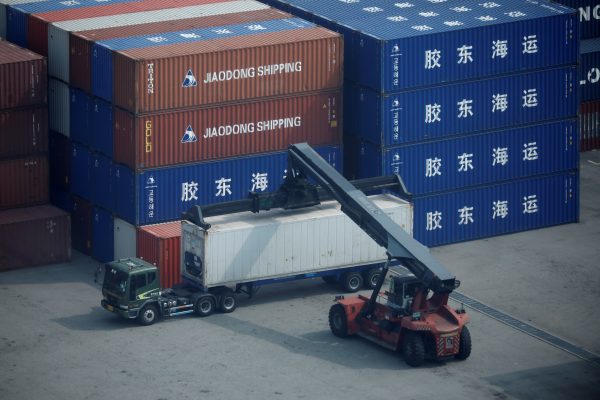 A truck moves a shipping container at Pyeongtaek port in Pyeongtaek, South Korea, 9 July 2020 (Photo: Reuters/Kim Hong-Ji).