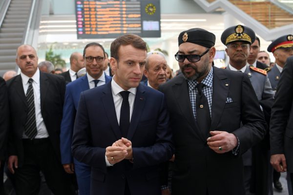 French President Emmanuel Macron and Moroccan King Mohammed VI speak as they attend the inauguration of a high-speed line at Rabat train station, in Rabat, Morocco November 15, 2018 (Christophe Archambault/Pool via Reuters)