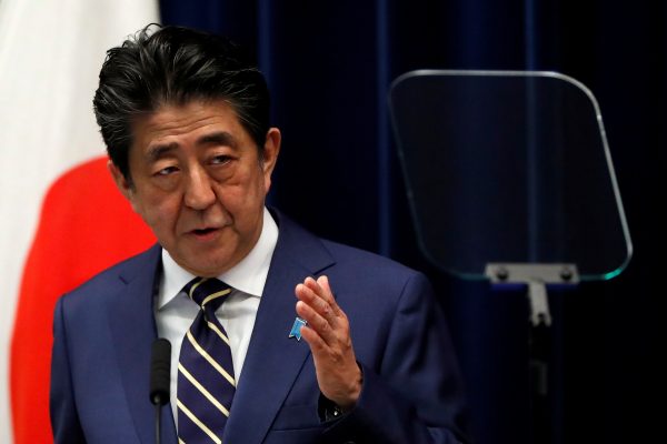 Japan's Prime Minister Shinzo Abe holds a news conference on Japan's response to the coronavirus disease (COVID-19) outbreak, at his official residence in Tokyo, Japan, 28 March 2020 (Reuters/Issei Kato).