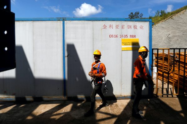 Labourers walk at Walini tunnel construction site for Jakarta-Bandung High Speed Railway in West Bandung regency, West Java province, Indonesia, February 21, 2019. Picture taken 21 February, 2019 (Photo: Reuters/Kurniawan).