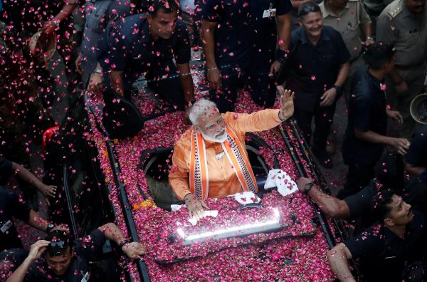 India's Prime Minister Narendra Modi waves towards his supporters during a roadshow in Varanasi, India, 25 April, 2019 (Reuters/Adnan Abidi/File Photo).