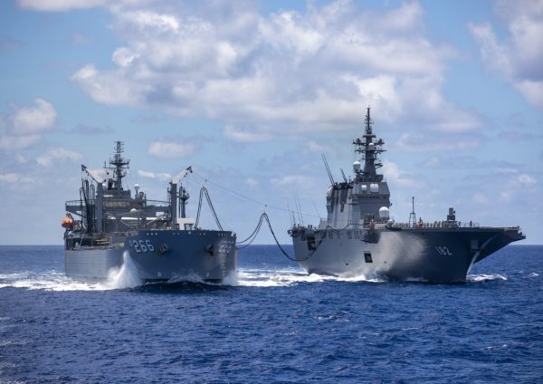Australian supply ship HMAS Sirius and Japanese helicopter carrier Ise during exercises in the Pacific in August 2020 (Photo: LSIS Christopher Szumlanski/Australian Department of Defence).
