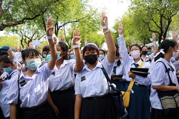 Anti-government protesters and students wearing white ribbons attend a demonstration demanding the government to resign, in front of the Ministry of Education in Bangkok, Thailand, 5 September 2020 (Photo: Reuters/Soe Zeya Tun).