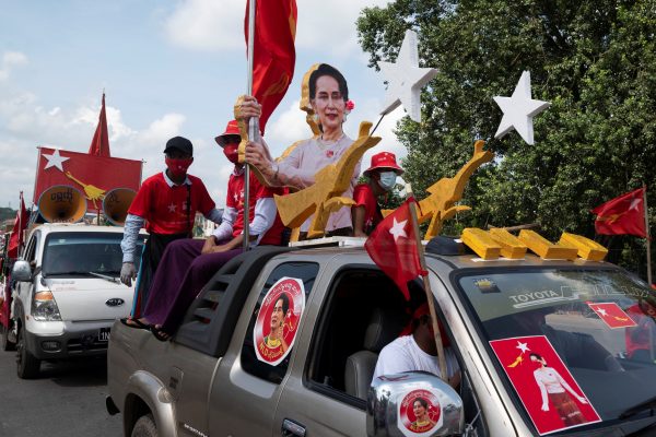 Supporters of National League for Democracy (NLD) party take part in a campaign rally ahead of a 8 November general election in the outskirts of Yangon, Myanmar, 25 October 2020 (Photo: Reuters/Shwe Paw Mya Tin).