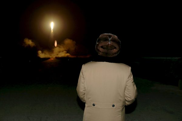 North Korean leader Kim Jong Un watches the ballistic rocket launch drill of the Strategic Force of the Korean People's Army (KPA) at an unknown location, in this undated file photo released by North Korea's Korean Central News Agency (KCNA) in Pyongyang, 11 March, 2016 (Reuters/KCNA).
