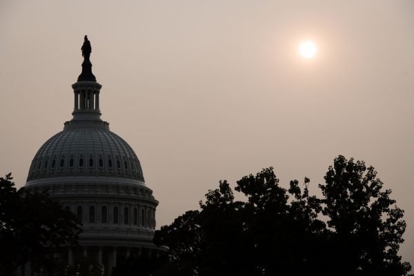 A general view of the US Capitol Building with a hazy sunset caused by smoke blown across the country from the intense forest fires on the West Coast, in Washington DC, on 15 September 2020 (Photo: Reuters/Graeme Sloan/Sipa USA).