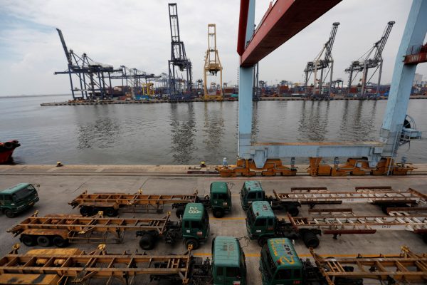 Trucks are parked at Tanjung Priok port in Jakarta, Indonesia, 6 May 2019 (Photo: Reuters/Willy Kurniawan)