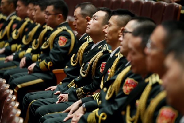 Military band members sit inside the Great Hall of the People during the ceremony to mark the 90th anniversary of the founding of the China's People's Liberation Army in Beijing, China, 1 August 2017 (Photo: Reuters/Damir Sagolj).